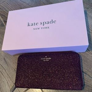 Unused Kate Spade Shimmy Glitter zippered wallet.